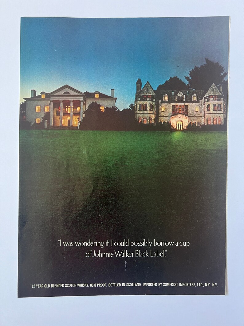 May include: A vintage advertisement for Johnnie Walker Black Label Scotch Whisky. The ad features two large houses at night with the text "I was wondering if I could possibly borrow a cup of Johnnie Walker Black Label." and "12 YEAR OLD BLENDED SCOTCH WHISKY. 86.8 PROOF, BOTTLED IN SCOTLAND. IMPORTED BY SOMERSET IMPORTERS, LTD., N.Y., N.Y."