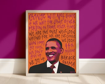 May include: A framed art print featuring a portrait of Barack Obama against an orange background. The text reads: Change Will Not Come if we wait for some other person or some other time. We are the ones we've been waiting for. 44th President.