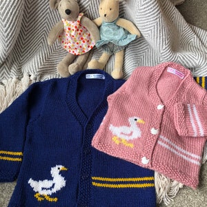 Baby cardigan, duck detail with stripes. Ready now, Newborn/preemie in pink,  6-12 months in navy blue.