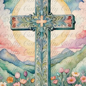 Peut inclure: Une peinture &agrave; l'aquarelle d'une croix bleue et verte avec des motifs floraux complexes. La croix est plac&eacute;e sur un fond de coucher de soleil sur des montagnes et un champ de fleurs color&eacute;es.