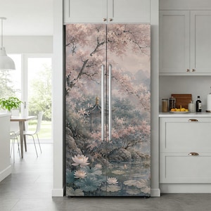 May include: A double-door refrigerator featuring a full-length wrap design of a serene landscape. The artwork depicts a pagoda nestled among blooming cherry blossom trees, rocky terrain, and a pond filled with white lotus flowers and lily pads.