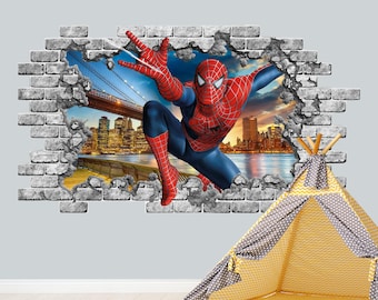 May include: A wall decal featuring a 3D-style hole in a gray brick wall revealing a cityscape with a bridge at sunset. Spider-Man is depicted in a dynamic pose, wearing a red and blue suit with a black web pattern, emerging from the opening.