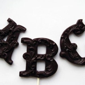 Filigree Letters and Symbol Lollipops 3-piece set by I Want Candy!