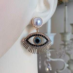 egyptian earrings  horus ra evil eye design goddess   statement  jewellery  plate pierced posts costume jewellery goddess worship crystal