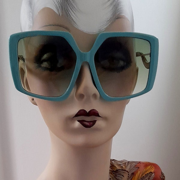 Azul turquesa brazo blanco 70s retro 60s lentes polarizados chic de gran tamaño esquí conducción piscina crucero desgaste elegante grandes sombras mod hip hop funky