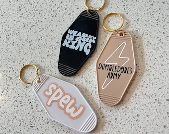 Subtiele Fandom Motel-sleutelhanger: handgemaakte retro-sleutelhanger