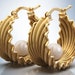 see more listings in the Gold Hoop earrings section