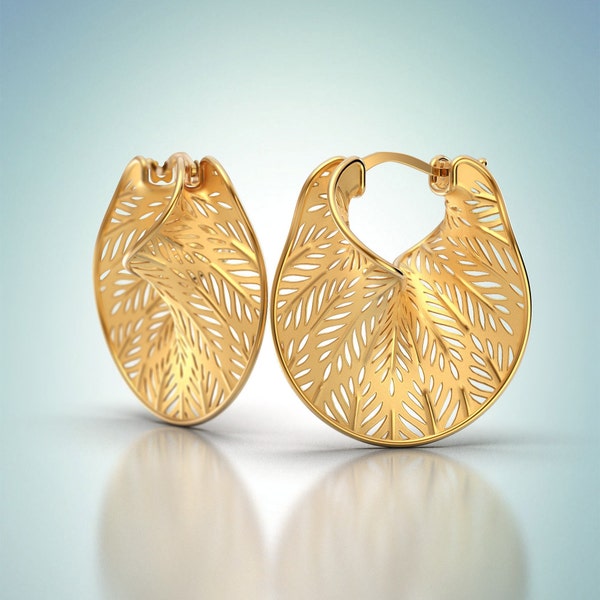 18k solid gold twisted hoop earrings made in Italy. 14k real gold large hoop earrings. Openwork gold hoop earrings by Oltremare Gioielli.