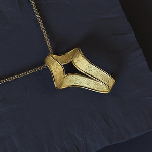 Handmade Italian gold cross charm in white gold with modern design