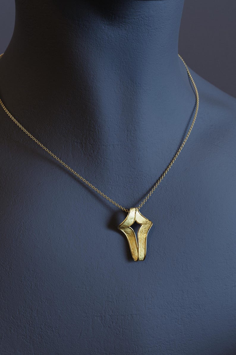 Contemporary cross pendant with rough matte finish and shiny borders