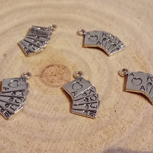 set of 5 silver card game pendants image 2
