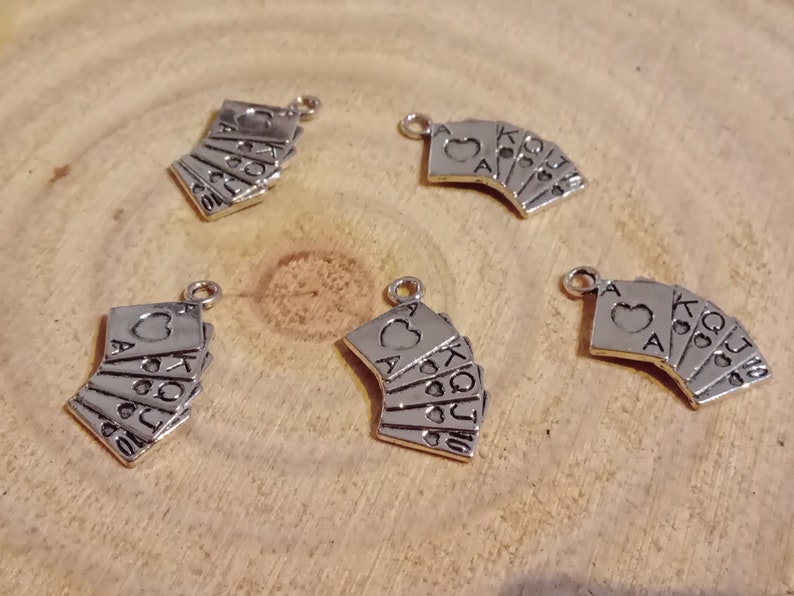 set of 5 silver card game pendants image 2