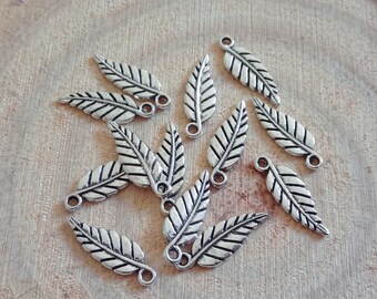 lot of 10 old silver leaf charms