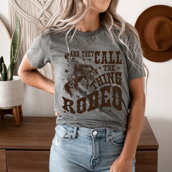 Women's And They CALL The THING RODEO Tee T-Shirt Rodeo Barn Horses Ranch Rural Farm Country Graphic Tee Plus Sizes avail up to 4X 5XL 5XL