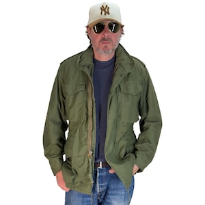 Small Reg. Alpha industries Authentic 1976 US M-65 field jacket .Military