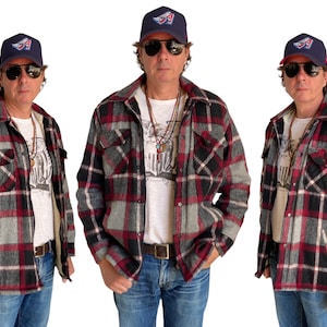 Large. Heavy plaid zipper jacket made by Northern Summit