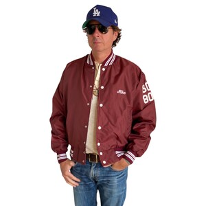 Large. 1991 Vintage Nylon track jacket / Varsity. Made in USA
