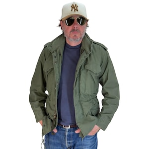X small . Alpha Industries US M-65 field jacket.  Military