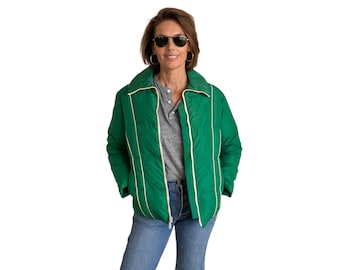 Women size Med. Vintage Down filled ski jacket