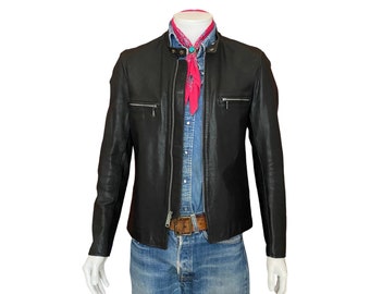 Size 40 US/ 50 Euro. Vintage 70s black cafe racer leather jacket with talon zipper