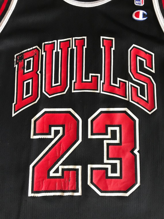 Rare Champion Black & Red Michael Jordan Chicago Bulls #23 Jersey Sz 48