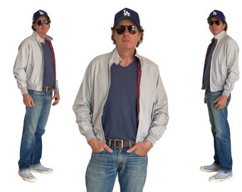 Talla pequeña. Chaqueta ligera con cremallera vintage de los años 80.