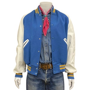 Maat medium. Vintage jaren 90 varsityjack met leren mouw Made In USA