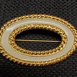 Vintage Monet Oval White Enamel Brooch with Braided Gold tone Border