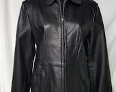 Black leather jacket. Smooth. Soft. Sophisticated styling.