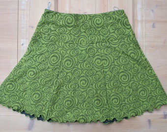 short skirt in lime green-dark grey made of cloqué jersey, swirl pattern with elastic waistband, mini skirt green-grey, jersey knit, various colours