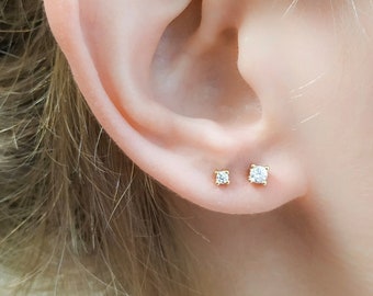 multiple stud earrings
