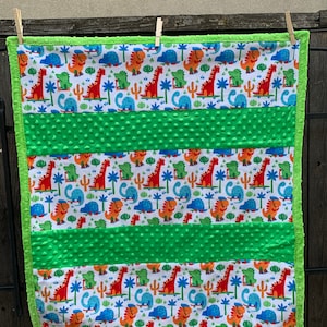Bright colored dinosaurs with green borders