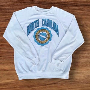 Rare! Vintage Distressed 1980s Hanes North Carolina University CrewNeck LongSleeve Sweatshirt Big Logo Vintage Clothing University / Size L