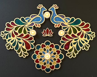 May include: A decorative peacock design with intricate details in shades of blue, green, red, and gold. The design features two peacocks facing each other with their tails spread out. There are four small white candles in the center of the design.