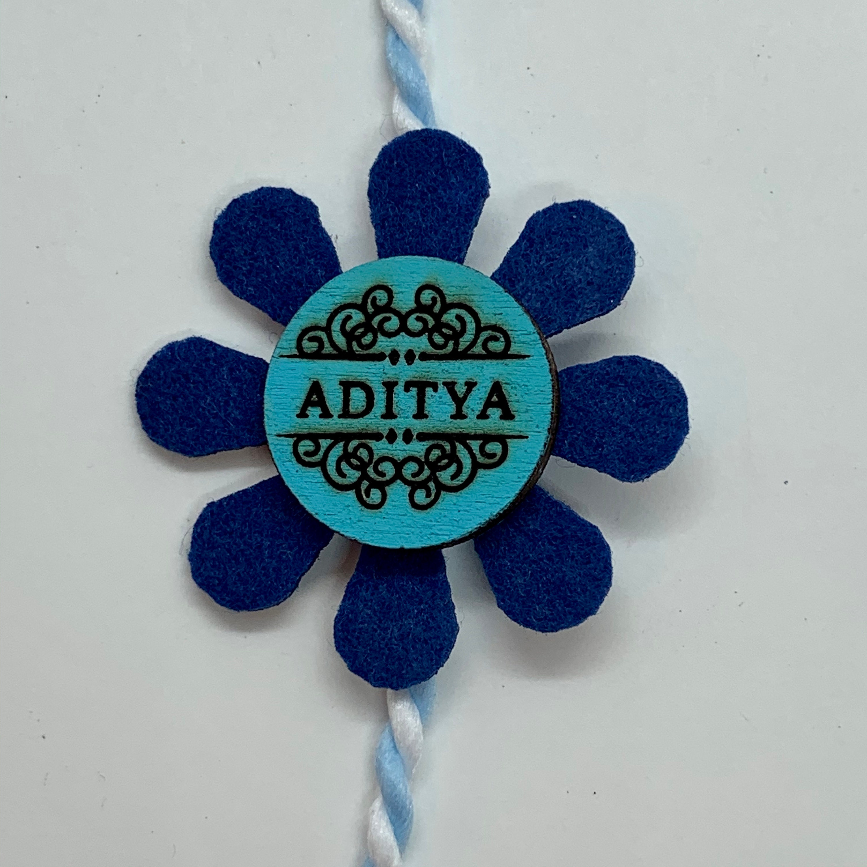 Customized Handmade Rakhi- made out of textile wood for little