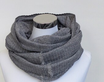 Tissu en maille gris boucle