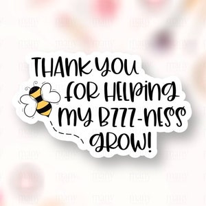 May include: White sticker with black text that reads "Thank you for helping my buzz-ness grow!" and a cartoon bee with black and yellow stripes.
