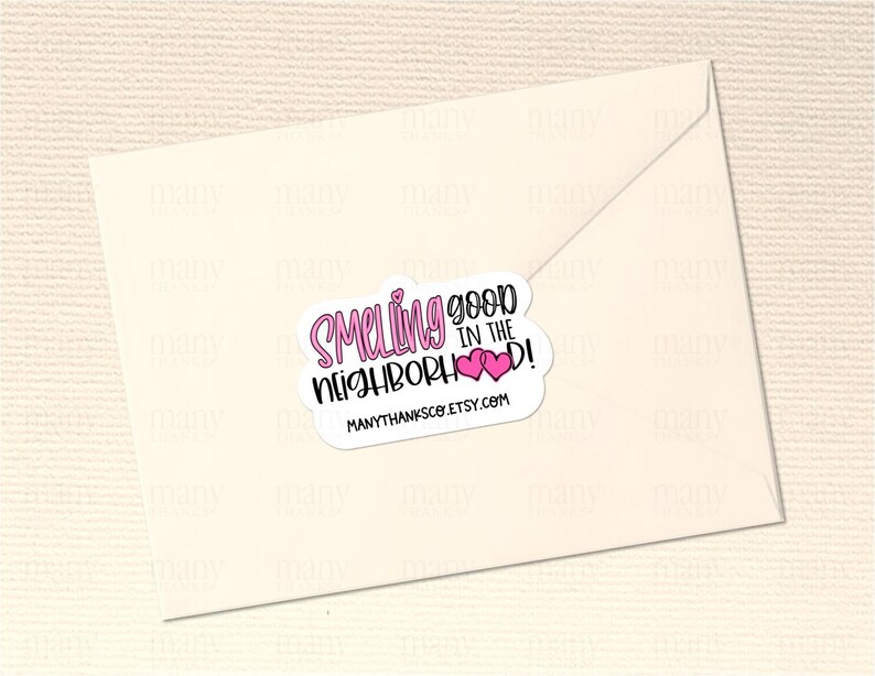 May include: Pink and white sticker with the text "Smelling good in the neighborhood!" and two pink hearts. The sticker also includes the website "manythanksco.etsy.com".