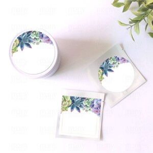May include: Three round labels with a watercolor design of succulents in shades of green, blue, and purple. The labels are blank and ready to be personalized.