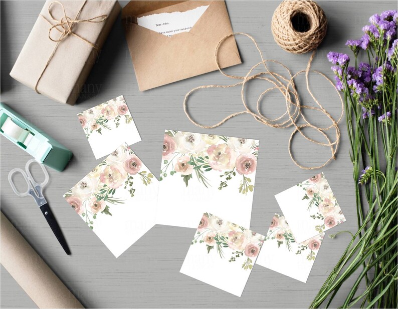 May include: Set of five blank cards featuring a watercolour floral design in shades of pink, white, and green. The cards are ideal for adding your own personal message.