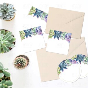 May include: A set of printable succulent themed party decorations, including invitations, place cards, and round labels. The designs feature watercolor illustrations of succulents in shades of green, purple, and blue.