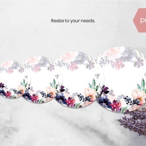 May include: Four round, white paper labels with a watercolor floral design in shades of pink, purple, and blue. The labels are arranged in decreasing size from left to right.