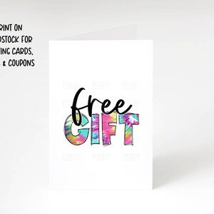 May include: A white card with the words "free gift" in black text. The letters are decorated with a colorful tie-dye pattern.