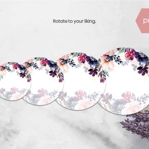 May include: Three round white paper plates with a watercolor floral design in shades of pink, purple, and blue. The plates are arranged in decreasing size from left to right.