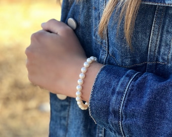 Genuine, round, white, full strand, freshwater pearl bracelet, 7-8mm, with sterling silver magnetic clasp.