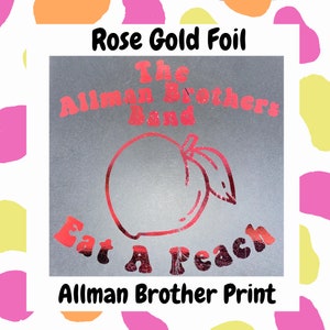 May include: Rose gold foil print of The Allman Brothers Band logo with the text "Eat A Peach" and the words "Allman Brother Print".