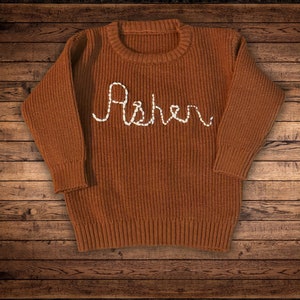 Coffee Brown Colored Baby Sweater with white embroidered name Asher