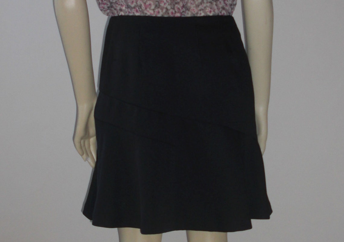 black knee length flared skirt