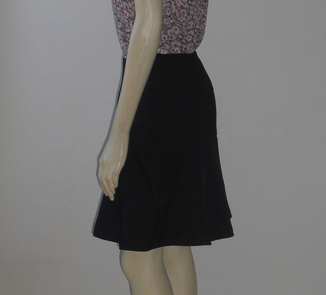 black knee length flared skirt