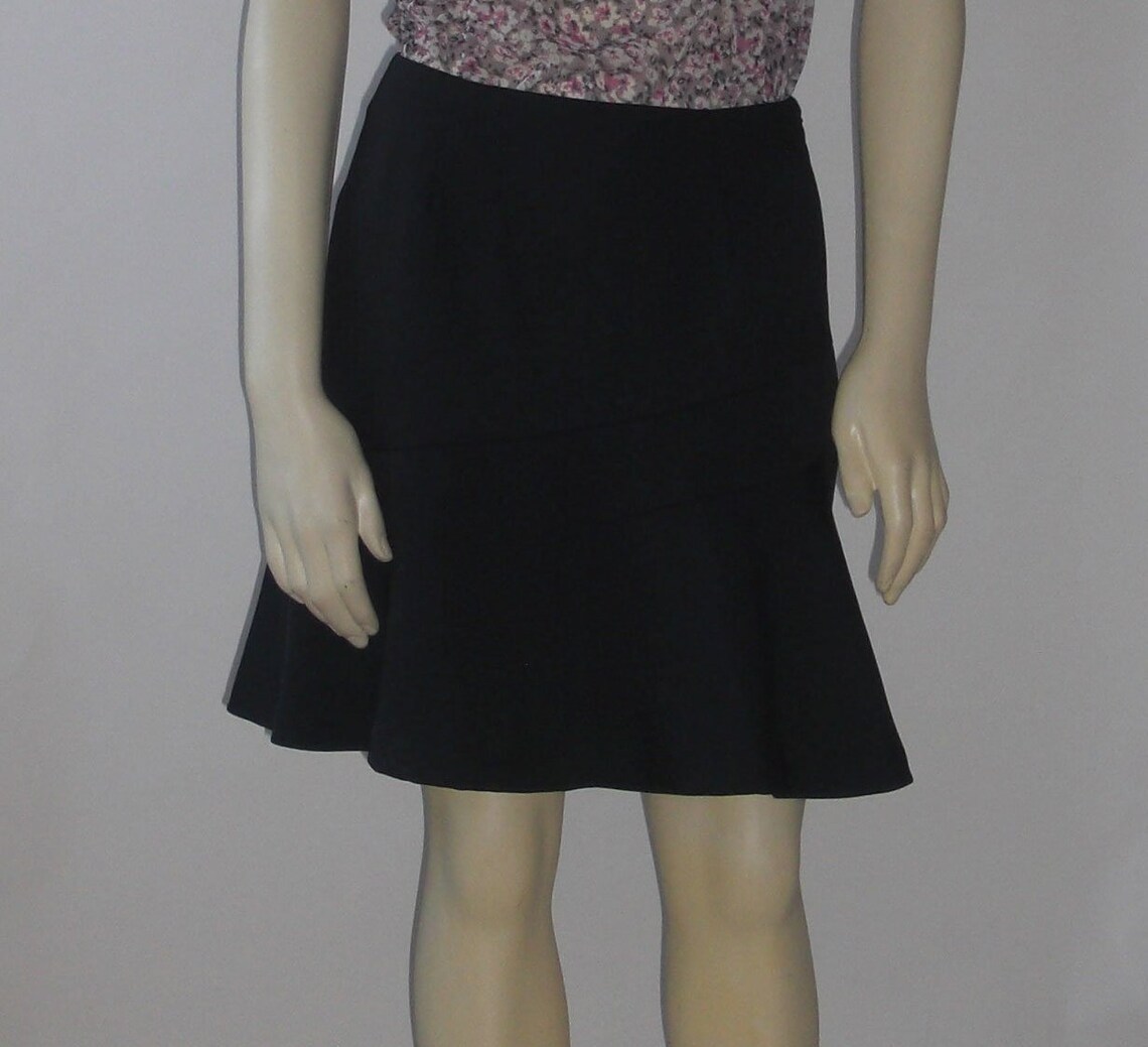 black knee length flared skirt